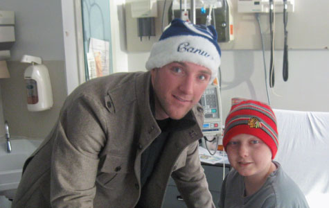 Cam Barker visits a boy in the hospital